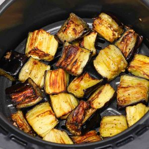 This Air Fryer Eggplant is a healthy and flavorful side dish that’s ready in under 20 minutes! Keep reading to learn how to roast eggplant in an air fryer quickly and easily.