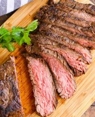 Slices of grilled bavette steak cooked medium with a warm pink color