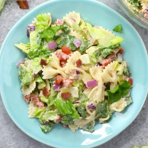 BLT Pasta Salad is a fabulous as a side dish or main course at a party or picnic, made with cooked pasta, bacon, vegetables and a creamy dressing. And it's ready in just 15 minutes!