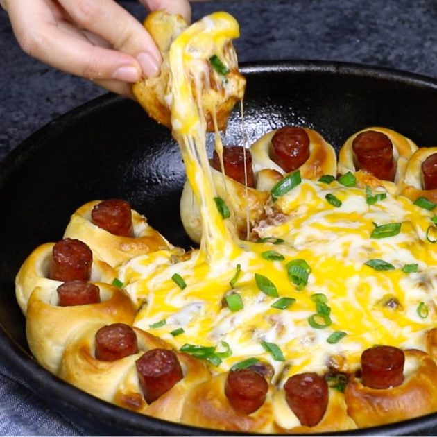 Chili Party Ring – this photo shows a cheese pull while serving this delicious appetizer
