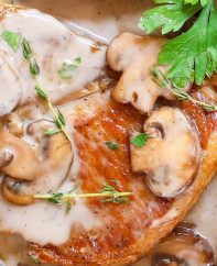 Cream of Mushroom Pork Chops with juicy and tender pork chops smothered in rich and creamy mushroom soup! This comforting Mushroom Pork Chops dish makes an easy dinner recipe for busy nights with one pan and 30 minutes!