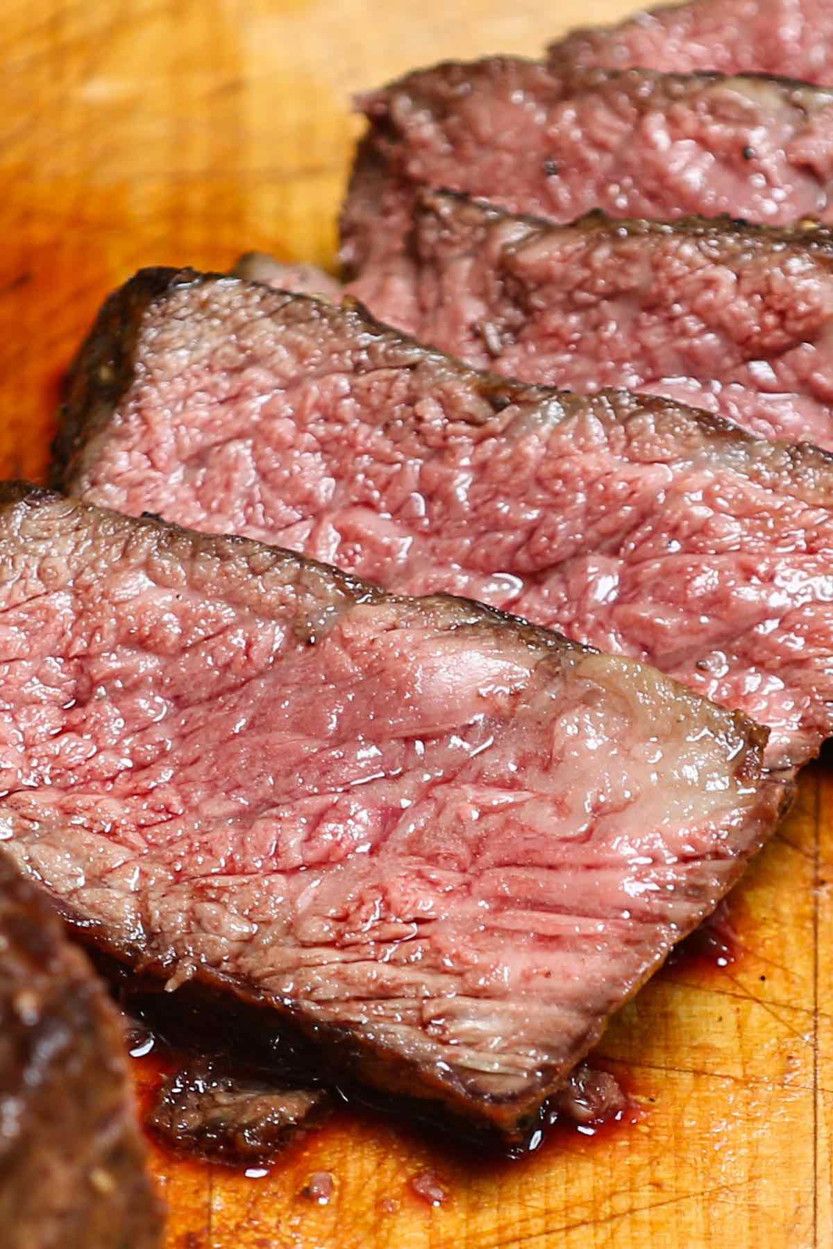 Slices of Denver steak cooked medium