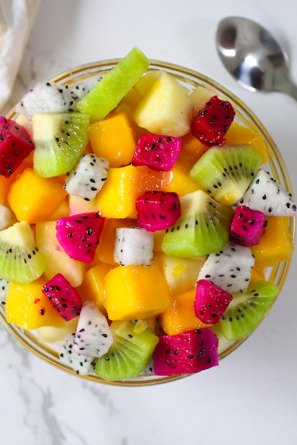 This dragon fruit salad bowl is made with chunks of dragon fruit, kiwi, mango and pineapple