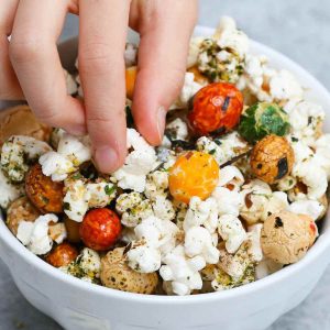 Are you looking for the perfect at-home movie snack? Look no further than Hawaiian Hurricane Popcorn. This easy treat is crunchy and buttery, with a bit of sweetness. Made with popcorn kernels, Japanese rice crackers, and furikake, this easy stove-top recipe is so much better than microwave popcorn and it takes less than 10 minutes to make!