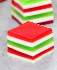 Easy Christmas Jello Shots – An easy and beautiful dessert spiked with vodka for a special party! Smooth and creamy Jello shots with bright red, green and white layers. All you need is a few simple ingredients: gelatin, strawberry and lime jello powder, vodka and condensed milk. So Good! Great for holiday and birthday parties. Easy recipe, party desserts. Finger food. No Bake. Vegetarian. Video recipe.