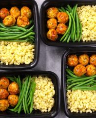 This meatball meal prep features BBQ meatballs with cooked pasta and green beans