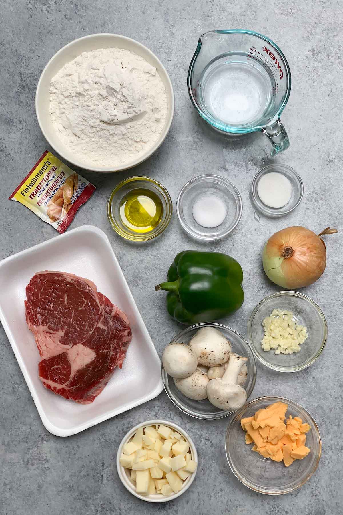 Ingredients for making homemade Domino's Philly Cheese Steak Pizza