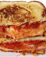 This Double Decker Pizza Sandwich recipe may be the best grilled cheese ever