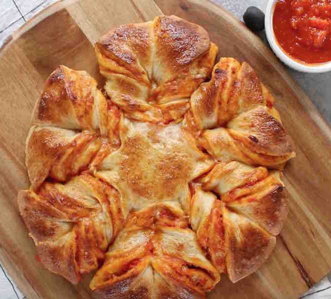 This stunning Pull Apart Pizza Braid is a delicious party appetizer thats perfect for sharing