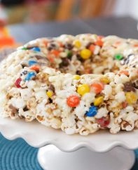 This Popcorn Cake recipe from TipBuzz shows how to make a no-bake cake out of popcorn, marshmallows and candy
