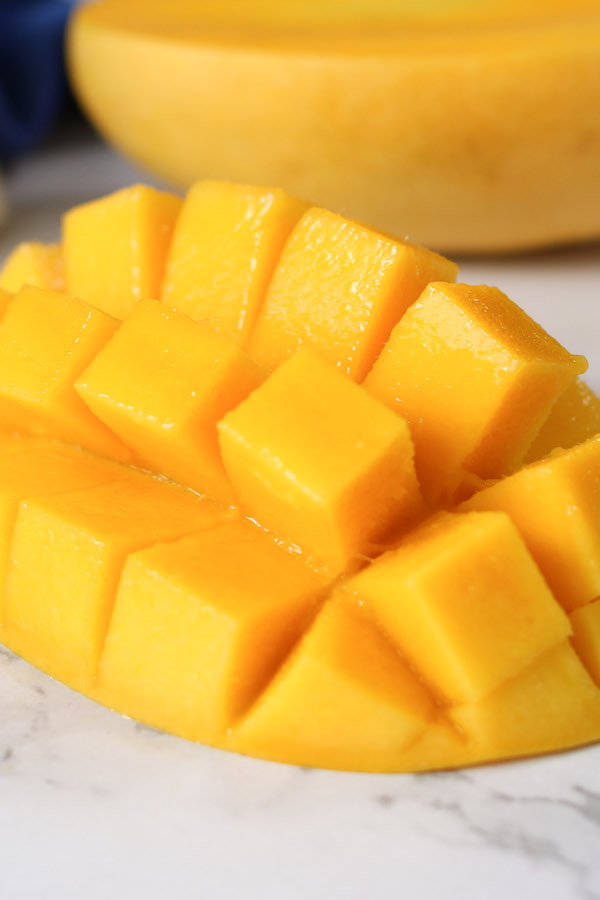 This ripe mango has juicy, golden colored flesh that's easy to cut into cubes