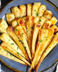 Roasted Parsnips are a very simple but delicious vegetable side dish that’s sweet and tender. This recipe makes perfect parsnips with a caramelized surface that enhances the natural flavor.