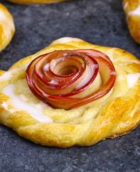 This Rose Apple Danish has a beautiful apple rose in the middle surrounded by flaky pasty and topped with homemade icing