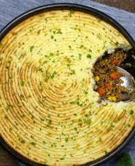 The Best Skillet Shepherd’s Pie – Loaded with delicious and flavorful filing of beef, onions, carrots, green beans and corn, then topped with a buttery and creamy mashed potatoes with parmesan cheese. Baked to perfection golden color. An incredible comfort food! #DinnerRecipe. #shepherds pie Video recipe.