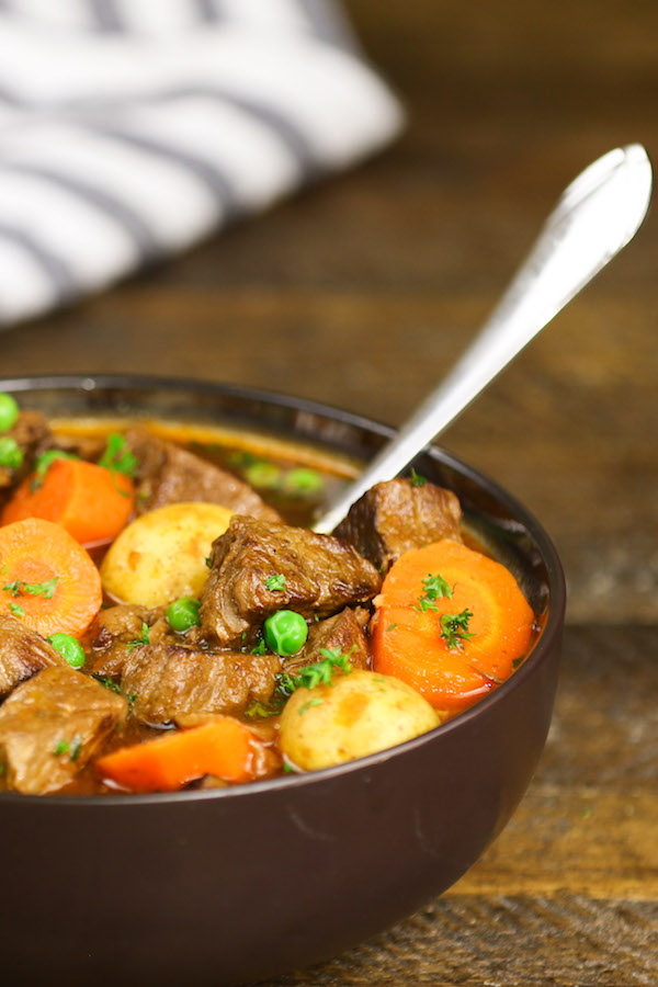 Side angle view of a serving of beef stew in a bowl