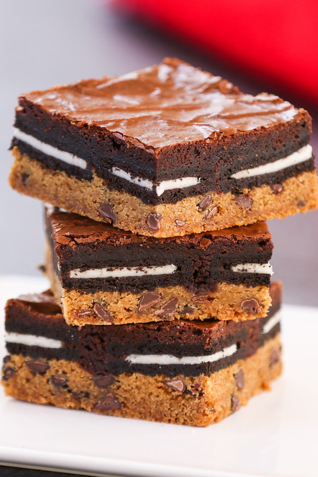 Oreo cookie brownies cut into squares on a serving plate