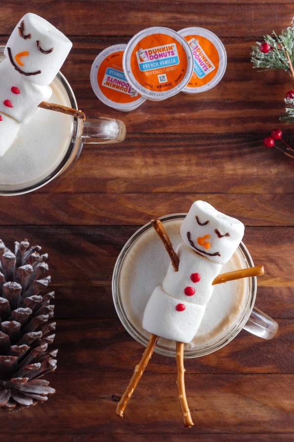 These Snowman Mocha Lattes are the perfect hot drink to serve guests during the holidays and they only take a few minutes to prepare using Dunkin' Donuts K-cups coffee pods