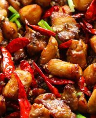 This Szechuan Chicken is the classic Chinese dish made with chicken thighs, Szechuan peppercorns, dried chilis, garlic, ginger and green onions. It makes a fabulous dinner idea for anyone who loves spicy food!