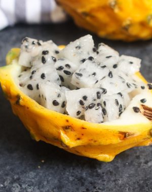 Yellow dragon fruit flesh cut into chunks and served in the skin